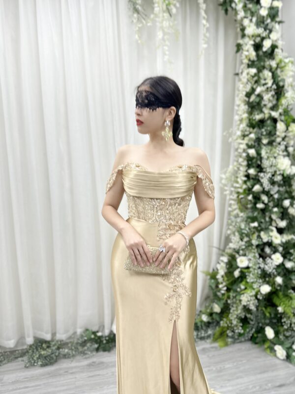 champagne beaded corset evening gown with satin mermaid skirt and high slit