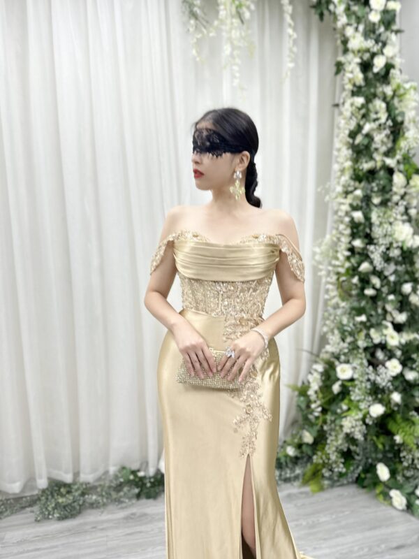 champagne beaded corset evening gown with satin mermaid skirt and high slit