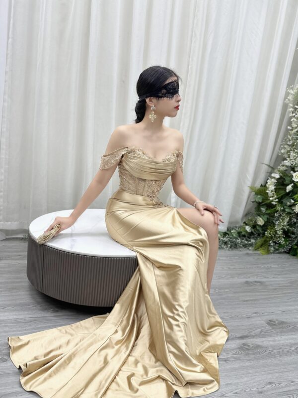 champagne satin formal gown with beaded off-the-shoulder bodice and mermaid train