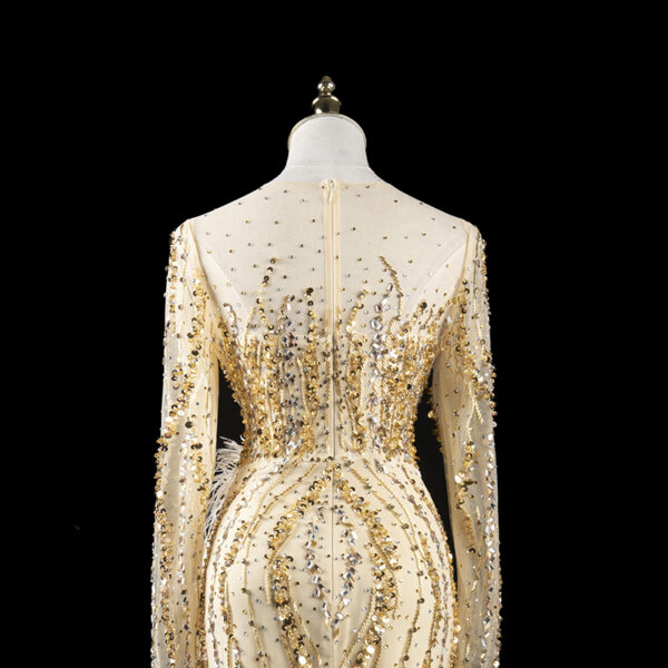 Custom Champagne Beaded Mermaid Gown with Feather Embellishments