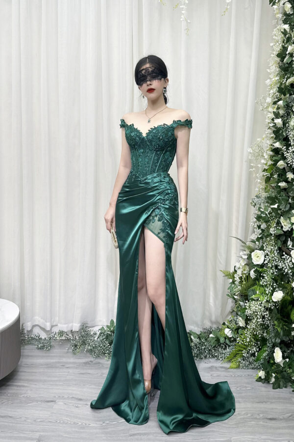 emerald green lace mermaid evening gown with off-the-shoulder corset bodice and high slit