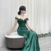 emerald green satin formal gown with lace off-the-shoulder bodice and mermaid train
