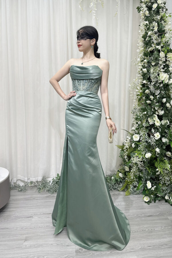 sage green satin mermaid evening gown with strapless cowl neck and beaded lace corset