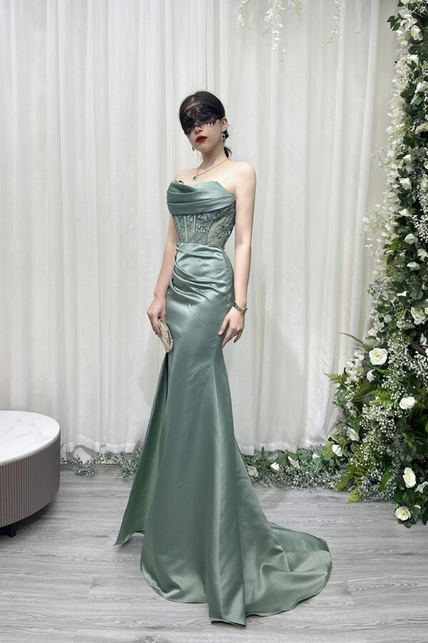 sage green satin mermaid prom dress with beaded lace corset and train