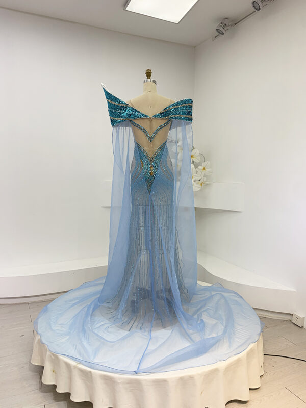 Luxury Crystal Beaded Pageant Gown with Dramatic Sheer Cape