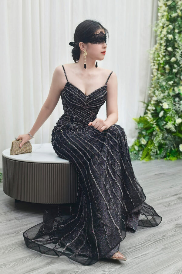 black glam evening dress with vertical bead stripes and mermaid skirt