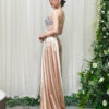 champagne beaded evening gown with satin mermaid skirt and side draping