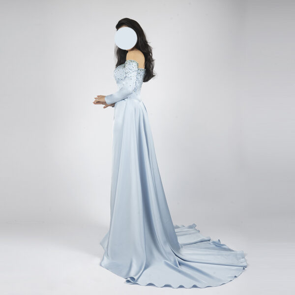 Elegant light blue satin evening gown with off-the-shoulder beaded top, long sleeves, and trailing train