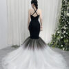 Ethereal black halter mermaid gown with gradient tulle skirt (black to white) and floor-sweeping train.
