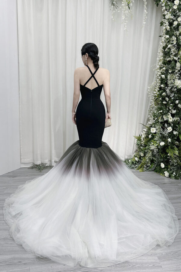 Ethereal black halter mermaid gown with gradient tulle skirt (black to white) and floor-sweeping train.