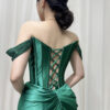 Ethereal emerald green mermaid gown with feathered collar, beaded detailing, and sheer chiffon cape train, formal evening wear for women