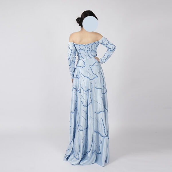 Ethereal light blue off-shoulder gown with 3D flower appliqué, blue leaf embroidery, long sleeves, and floor-length satin skirt