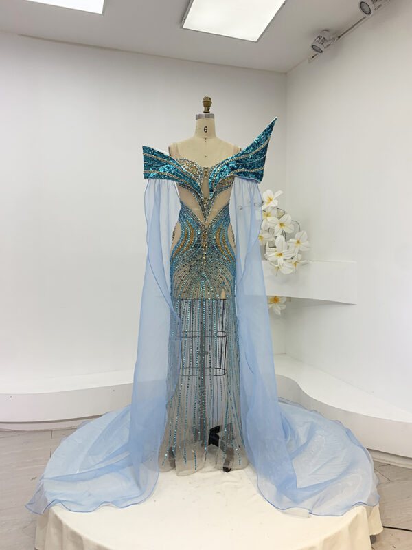 Luxury Crystal Beaded Pageant Gown with Dramatic Sheer Cape