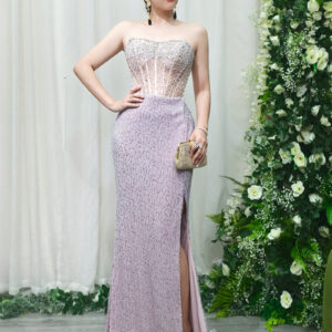 lavender beaded mermaid evening gown with sheer corset bodice and side slit