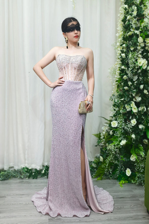 lavender beaded mermaid evening gown with sheer corset bodice and side slit