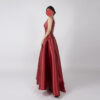 Luxe red satin ball gown with square neck, beaded bodice, and full floor-length skirt, formal evening wear for special occasions.