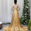 Luxury gold lamé pleated formal dress with sleeveless deep V-neck, high slit, and trailing train.