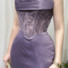 Modern lavender strapless mermaid gown with lace corset detailing and glossy satin skirt.