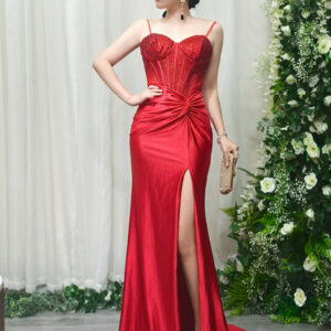 red beaded mermaid evening gown with sweetheart corset bodice and high slit