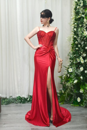 red beaded mermaid evening gown with sweetheart corset bodice and high slit