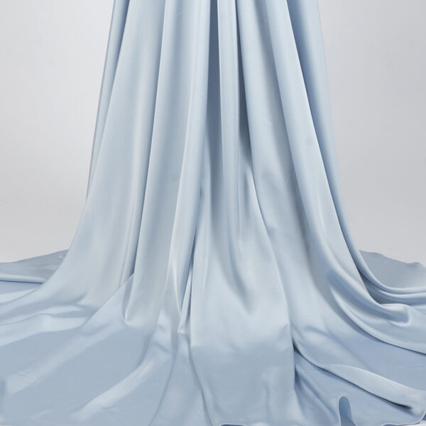 Romantic light blue off-shoulder satin gown with beaded bodice, long sleeves, and mermaid train