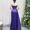 Elegant purple satin strapless evening dress with ruched bodice and high side slit.