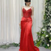 Elegant red satin mermaid dress with beaded bodice and deep V-neckline.