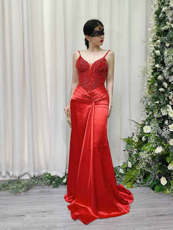 Elegant red satin mermaid dress with beaded bodice and deep V-neckline.