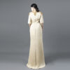 Champagne Gold Evening Gown with Hand-Beaded Leaf Appliqué