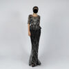 Black Sequin Evening Gown with Elegant Leaf Pattern and Sheer Sleeves