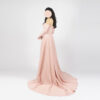 Blush pink off-the-shoulder mermaid gown with ruched waist, long flared sleeves, and satin train