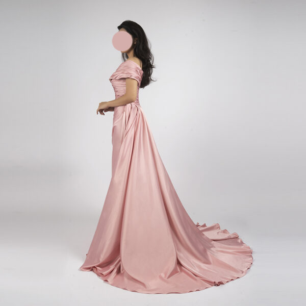 Dusty rose off-the-shoulder satin gown with ruched bodice, draped skirt, and trailing train