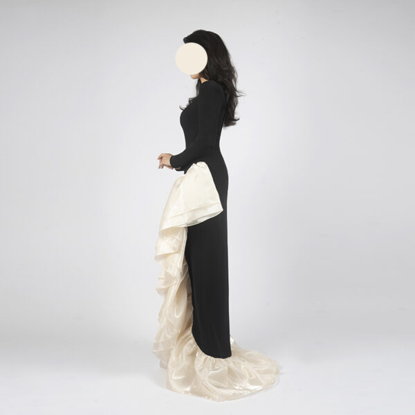 Luxury black mermaid formal gown with champagne organza ruffle and long sleeves, perfect for Dubai red carpet events