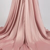 Romantic dusty rose off-shoulder satin gown with ruched bodice, draped skirt, and trailing train