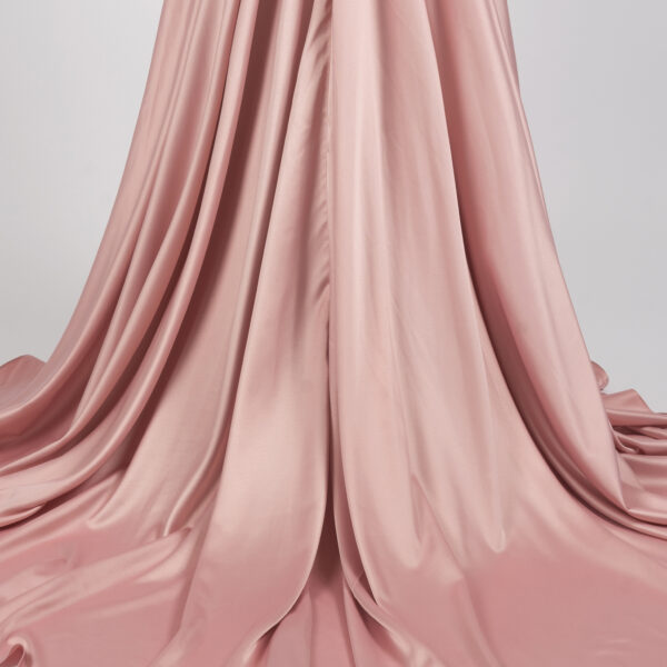 Romantic dusty rose off-shoulder satin gown with ruched bodice, draped skirt, and trailing train