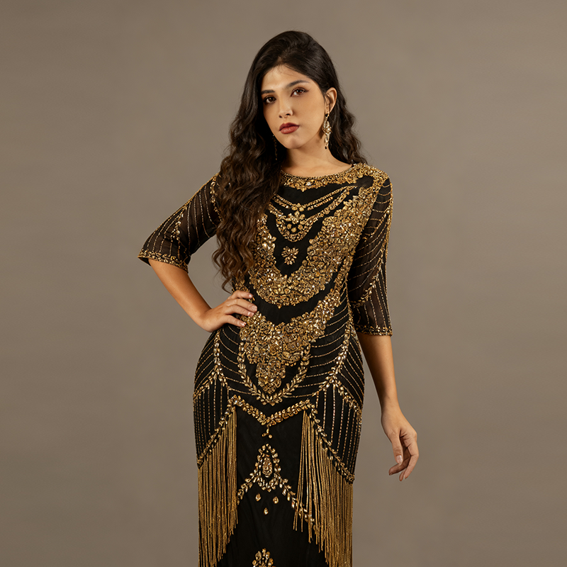 Glamorous Art Deco Black Evening Dress with Gold Sequin Beading and Fringe Details