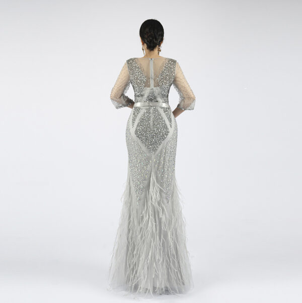 Silver Hand-Beaded Evening Gown with Crystal Embellishment and Feather Hem