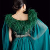 Luxe teal green mermaid evening dress with feather collar, beaded embroidery, and flowing sheer cape, formal wear for special occasions