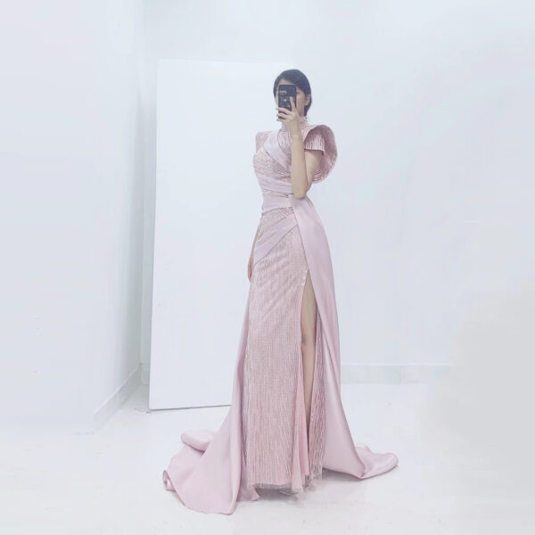 Elegant blush pink couture evening dress with shimmering sequin panel